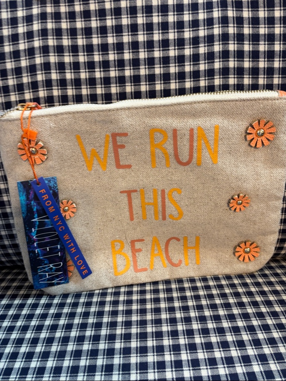 Violet ray Canvas Beach Pouch with Orange Floral Accents - "We Run This Beach"